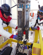 Scientists recovering an instrument from subglacial Lake Whillans.